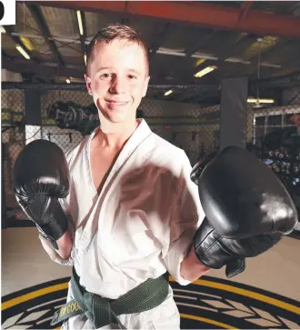  ?? AMBITION: Townsville MMA junior Koby Wood- Lynch, 14, is on the rise. Picture: ALIX SWEENEY ??