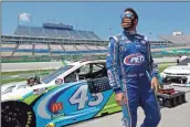  ?? AP-Mark Humphrey ?? Bubba Wallace waits for the start of a NASCAR Cup Series auto race in Sparta, Ky., on July 12.