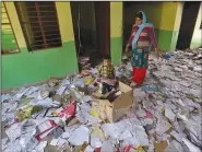  ?? (AP) ?? Books lie scattered Wednesday at the Rajdhani Public School that was vandalized in Tuesday’s violence at Shiv Vihar in New Delhi, India.