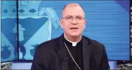  ?? HONS / Associated Press ?? In this photo made from video, Bishop John Barres of the Catholic Diocese of Rockville Centre announces that the diocese has filed for Chapter 11 bankruptcy protection Thursday in Rockville Centre, N.Y. because of financial pressure from lawsuits over past sexual abuse by clergy members.
