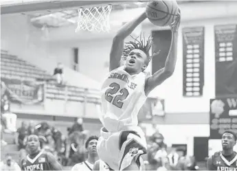  ?? SENTINEL FILE ?? Ninth-grader Ja’Cari Henderson, going up strong to the basket against Apopka, and his twin, DeMari Henderson, have helped Seminole win 15 consecutiv­e games and rise from No. 7 to No. 3 in the Sentinel Super 16 rankings.