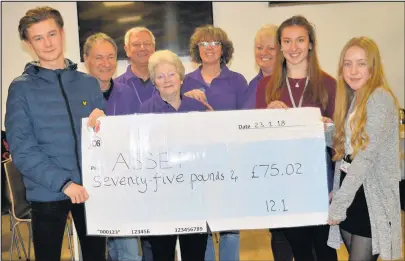  ??  ?? Hinckley Academy and John Cleveland Sixth Form Centre Year 12 students Sam Truman left, and Yoana Yankova and Freya Kendrick, second right and right, presented a cheque for £75 to founder Keith Sudbury and four volunteers from Asset, the Adrian Sudbury...