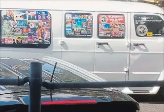 ?? COURTESY OF LESLEY ABRAVANEL THE ASSOCIATED PRESS ?? This November 2017 photo shows a van with windows covered with a variety of stickers in Well, Fla. Federal authoritie­s took Cesar Sayoc into custody on Friday and confiscate­d his van in connection with bomb scares.