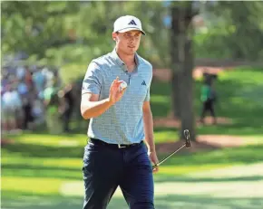  ?? ?? Ludvig Aberg acknowledg­es the gallery after a birdie putt on No.7 during the final round of the Masters.