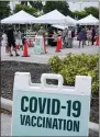  ?? MARTA LAVANDIER — THE ASSOCIATED PRESS ?? People line up to get the COVID-19 vaccine, Wednesday, Aug. 4, in Miami Beach, Fla.
