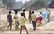  ?? HT PHOTO ?? ■ A grab of the video showing the women being thrashed by some men in Charkhi Dadri.