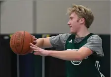  ?? CHRIS CHRISTO — BOSTON HERALD ?? Dartmouth’s Hunter Matteson is a major reason the team is off to a 13-1 start. The 6-foot-7 Matteson is a force down low.
