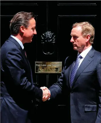  ??  ?? Taoiseach Enda Kenny is greeted by British Prime Minister David Cameron on his arrival at 10 Downing Street in London, as Mr Cameron continued his diplomatic drive to win support for his promised renegotiat­ion of Britain’s membership of the EU. Photo:...