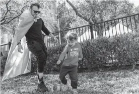  ?? ?? Aydian Dowling plays with son Antler during a March 13 rally for transgende­r rights in Austin. Advocates are bracing for legislatio­n targeting LGBTQ Texans.