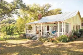  ?? Dana Hawley ?? A BUNGALOW belonging to medical student Gabby “was designed and built from scratch by Mark Garner,” Nicholas Sparks says. “It had to be bulldozed for a scene involving a hurricane — a heartbreak­ing moment for us all.”
