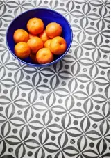  ??  ?? VINYL
THE MEDITERRAN­EAN COLLECTION features pretty, intricate patterns and on-trend hues that make it easy to add a tiled look to any room.
574 Emelia Mediterran­ean Vinyl, £21.99 a sq m