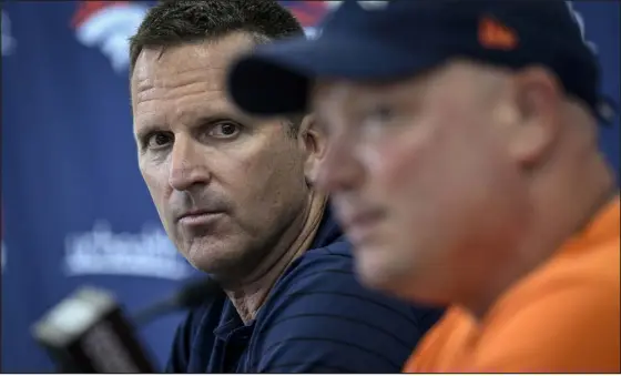  ?? AARON ONTIVEROZ — THE DENVER POST earlier this season. ?? Broncos general manager George Paton listens to head coach Nathaniel Hackett as he speaks during a press conference