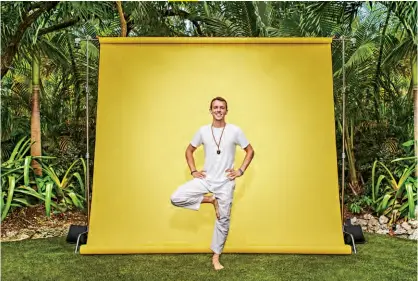  ?? ?? Palm Tree Pose “The solitude here is powerful. I’m able to think for myself. It’s led to a lot of our breakthrou­ghs as a business,” says Breslow, who practices yoga daily in his Miami yard.