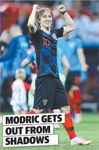  ??  ?? SPOTLIGHT: Croatian midfielder Luka Modric celebrates his team’s victory over England.