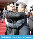  ??  ?? PANMUNJOM: South Korea’s President Moon Jae-in (right) hugs North Korea’s leader Kim Jong Un before their second summit at the north side of the truce village of Panmunjom in the Demilitari­zed Zone (DMZ). — AFP