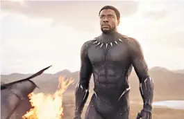  ??  ?? Boseman (2019); and as the black superhero Black Panther in a film he called ‘a sea-change moment’