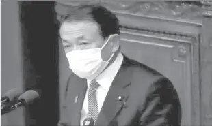  ??  ?? TOKYO
Japan's deputy prime minister Taro Aso attends a meeting.
-APP