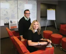  ?? MICHAEL SEARS, MILWAUKEE JOURNAL SENTINEL ?? Amanda Janssen-Egan and Mike Luedke at the advertisin­g agency Jigsaw in Milwaukee as junior partners in the firm.