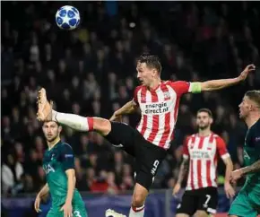  ?? AFP PIC ?? PSV Eindhoven’s Luuk De Jong leaps in the air to control the ball in a Champions League Group B match at Philips Stadium in Eindhoven on Wednesday.