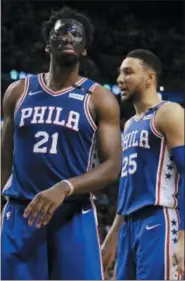  ?? THE ASSOCIATED PRESS FILE ?? Sixers’ young stars Joel Embiid, left, and Ben Simmons seem to have trouble not buying into the hype around them sometimes.