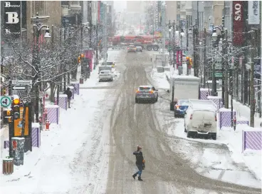  ?? Ryan remiorz / THE CANADIAN PRESS ?? An online survey of 1,000 Montreal-area residents indicated a majority of downtown employees worked from home at least a few days a week during the fourth quarter.