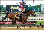  ?? FRANK FRANKLIN II / AP ?? Mo Donegal (6), with jockey Irad Ortiz Jr. up, crosses the finish line to win the 154th running of the Belmont Stakes on Saturday at Belmont Park in Elmont, N.Y.