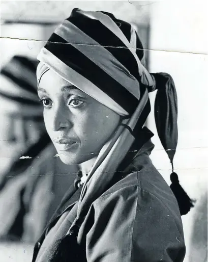  ??  ?? This portrait of Winnie, shot by Peter Magubane, went on to be a poster for the documentar­y ‘Winnie’