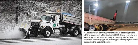  ?? MARSHALL GORBY / STAFF WCPO ?? An ODOT truck plows I-675 northbound near Beavercree­k. A Delta aircraft carrying more than 100 passengers slid off the pavement while taxiing at CVG Airport in Hebron, Kentucky, on Sunday morning, according to the CVG Airport’s Twitter page. No passengers or employees were injured in the accident.