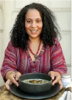  ?? Tribune News Service ?? ■ Elizabette Andrade poses for a portrait with her mushroom chowder in Philadelph­ia.