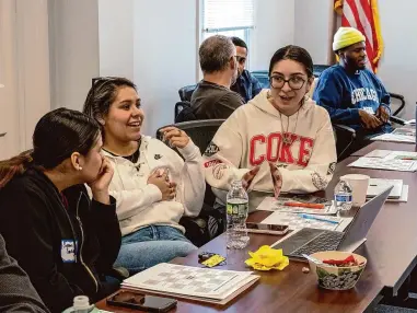  ?? Roz McCarthy/For Hearst Connecticu­t Media ?? Norwalkers from diverse background­s participat­ed in a one-hour civics lesson on local government on April 6. From left to right: cousins Sienna Santiago, Tatiana Santiago and Celia Herman Toro shared their ideas about identity when participan­ts were asked to form small discussion groups.