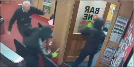  ??  ?? CCTV of the battle between Denis(left) and the raiders has gone viral online