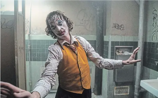  ?? NIKO TAVERNISE THE ASSOCIATED PRESS ?? Joaquin Phoenix is getting raving reviews for his performanc­e in “Joker”. But that doesn’t make the movie great.