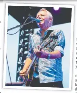  ??  ?? Top, Icehouse founder Iva Davies; above, headlining the St Kilda Festival in February (before Melbourne went into lockdown); and, below left, back when the band was still called Flowers.