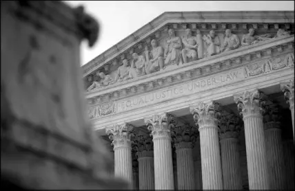  ?? PATRICK SEMANSKY / ASSOCIATED PRESS ?? The Supreme Court building is seen Thursday in Washington. The Senate Judiciary Committee heard from Supreme Court nominee Brett Kavanaugh and Christine Blasey Ford, the woman who says he sexually assaulted her.