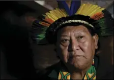  ?? ASSOCIATED PRESS ?? Davi Kopenawa, a Yanomami shaman, listens to reporters’ questions on Wednesday during a press conference after his meeting with Pope Francis at the Vatican.