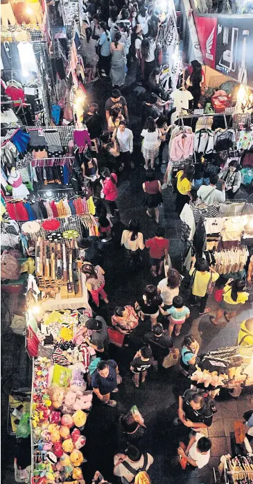  ??  ?? Bangkok’s public pavements are viewed as major obstacles for walking. Respondent­s found food vendors are less annoying than other obstructio­ns such as phone booths, uneven and discontinu­ed pavements, and advertisem­ent banners.