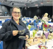  ?? Picture: BARBARA HOLLANDS ?? HAPPINESS IS: St Bernard’s Hospice CEO Melissa Knox enjoys a cuppa at the women’s tea and mini business expo fundraiser on Saturday.