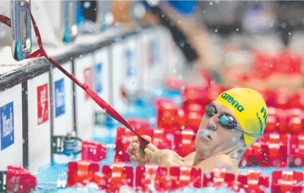  ?? Picture: GETTY IMAGES ?? GAMES ON HOLD: Cairns swimmer Grant Patterson prepares to race at the London 2019 World Para-swimming Allianz Championsh­ips.