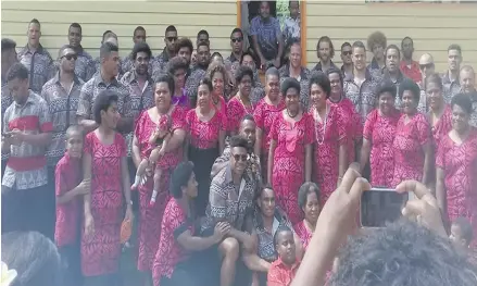  ?? Photo: NGWC ?? Vodafone Fiji Bati players with members of the New Gethsemane Worship Centre in Tacirua.East, Suva on October 15, 2017. This week the Bati are expected to visit schools in Ra that were destroyed during Cyclone Winston before they fly to Australia on...