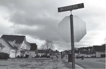  ?? STAFF PHOTO BY ALLISON SHIRK ?? Terri Hayes is concerned that a new residentia­l developmen­t east of her Woodburn Station neighborho­od, shown above, will lead to flooding in the area and added noise from traffic. The developer, Steven Henry, says the new developmen­t will include trees...