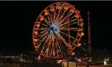  ??  ?? The Daytona Beach Ferris wheel offers great views of the ocean and city.