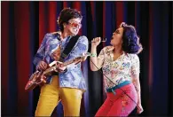  ?? (Special to the Democrat-Gazette/Wesley Hitt) ?? Greg Watanabe plays Chum, with K Chinthana Sotakoun as Neary/Sothea, in “Cambodian Rock Band” at TheatreSqu­ared in Fayettevil­le.