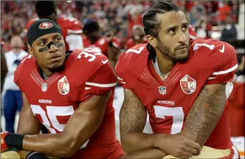  ??  ?? In this 2016 file photo, San Francisco 49ers safety Eric Reid (35) and quarterbac­k Colin Kaepernick (7) kneel during the national anthem before an NFL football game against the Los Angeles Rams, in Santa Clara, Calif.AP Photo/MArCIo JoSe SAnChez