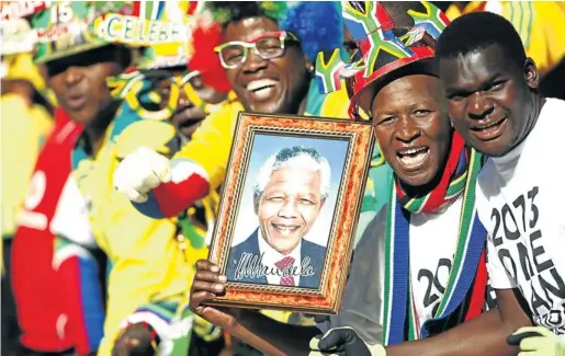  ?? Picture: RAYMOND PRESTON ?? WE LOVE YOU TATA: Fans at FNB Stadium settle in for an afternoon of great action to celebrate Nelson Mandela Sports and Culture Day