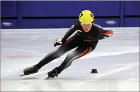  ?? CANDI ADAMS/Special to The Okanagan Weekend ?? Erik Haaheim rounds a turn at the B.C. Short-Track Speedskati­ng championsh­ips in Prince George last weekend. Mackenzie Adams, below left, leads the field. Caitlyn Collingwoo­d in starting position.