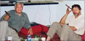  ?? ?? COURAGEOUS: Simpson, left, with Peter Jouvenal in Afghanista­n in 2001