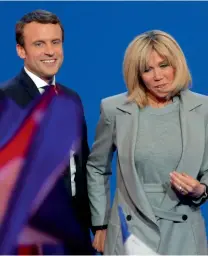  ?? AP ?? Macron and his wife Brigitte at his election day headquarte­rs in Paris. Right, Marine Le Pen with supporters after exit poll results. —