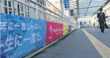  ??  ?? Rugby World Cup 2019 branding on display outside the train station in Toyota City