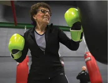  ?? TODD KOROL/THE CANADIAN PRESS ?? Shirley Jager, 79, and seven others have embraced boxing as part of their ongoing therapy for Parkinson’s disease.