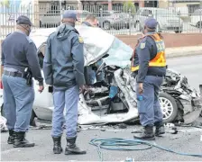  ?? ?? Police officers stand by as Damster’s personal belongings are removed from the vehicle.